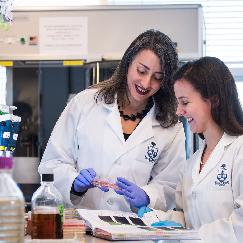 Dr. Leah Cowen and a student working in a lab