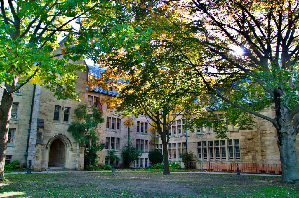 Exterior shot of St. Michael's College residence in the fall.