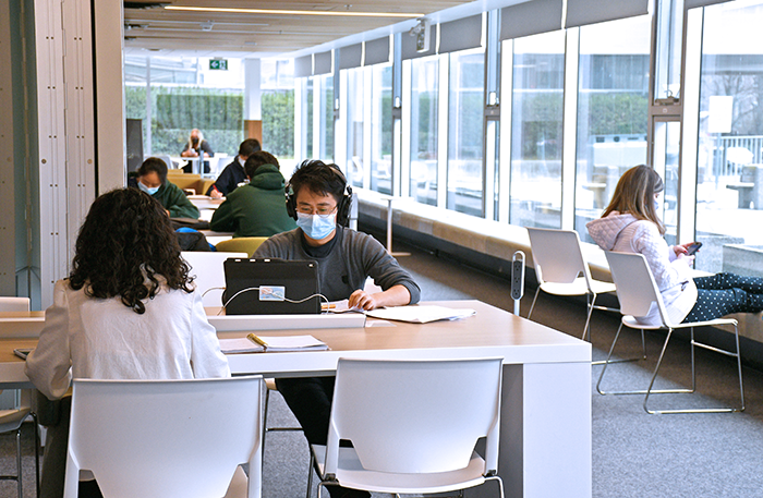Students studying in the Sidney Smith Commons
